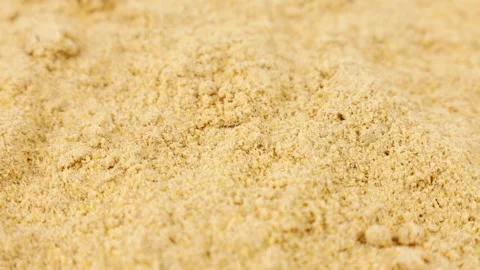 Ground dry ginger root spice powder circle rotation close up Stock Footage 274438432