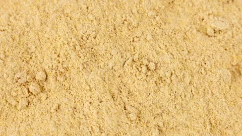Ground dry ginger root spice powder circle rotation close up top view Stock Footage 276382351