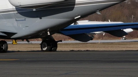 A ground "establishing shot" of high end private jets at Teterboro Airport Stock-Footage 119699791