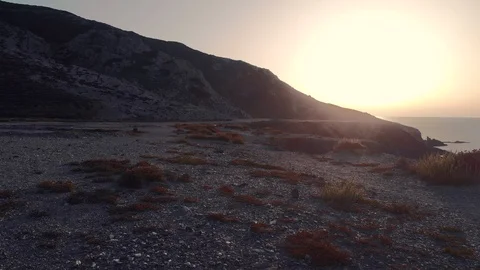 Ground flight over a cliff at sunset Stock Footage 126063879