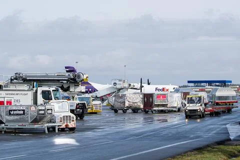 Ground handling and cargo unloading equipment Stock Photos