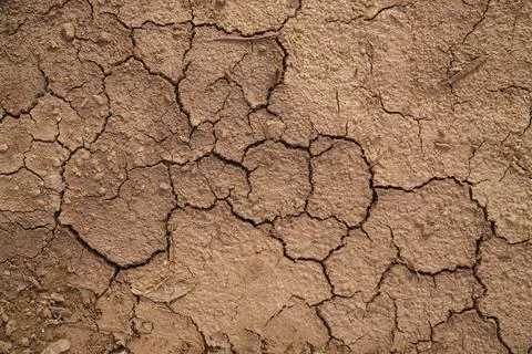 The ground has cracks in the top view for the background or graphic design .. Stock Photos