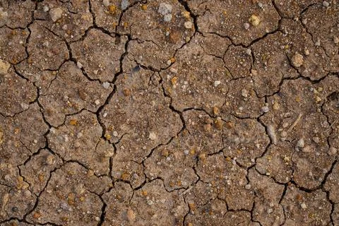The ground has cracks in the top view for the background or graphic design .. Stock Photos