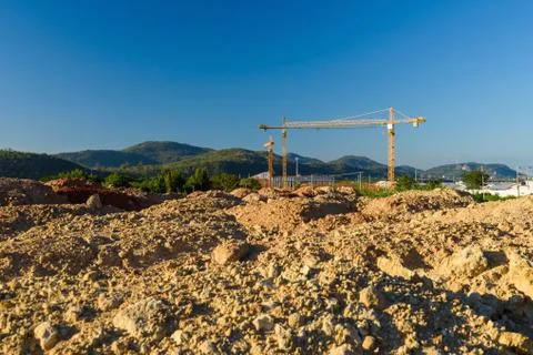 Ground level of construction site with crane Stock Photos