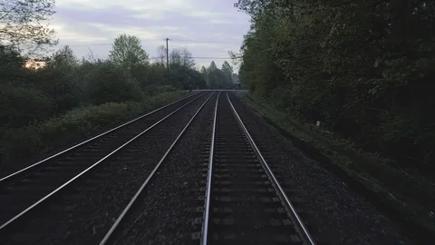A Ground Level Dolly Shot of Dual Train Tracks Stock Footage 89849661