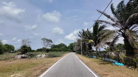 Ground Level Drive Along Pantai Semanyir Coastal Road Stock Footage 333035511