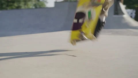 Ground Level Footage of a Skater Doing a Kickflip Stock Footage 208792470