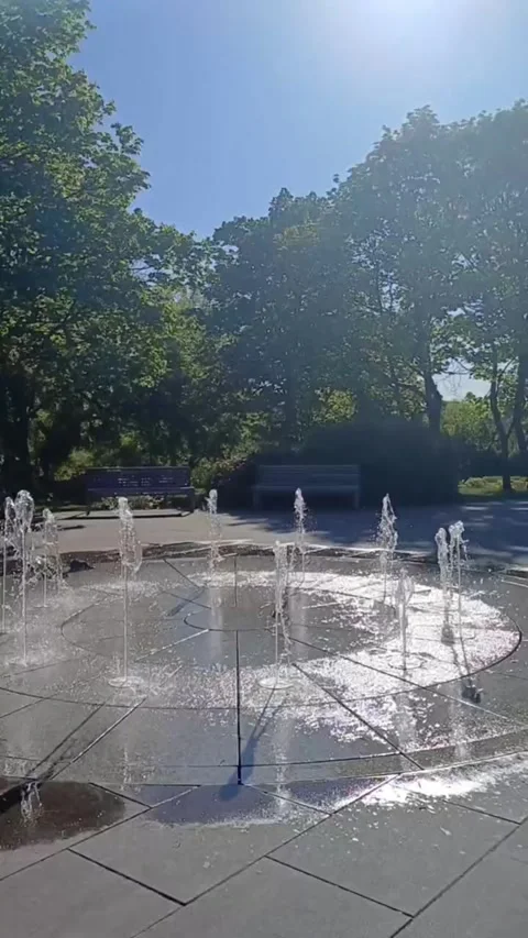 Ground-Level Jet Fountain Interactive Park Fountain Urban Water Jets City Stock Footage 308255344
