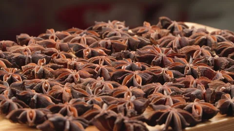 Ground Level Macro Of Dried Star Anise Spices On Wooden Board 스톡 동영상 331365653