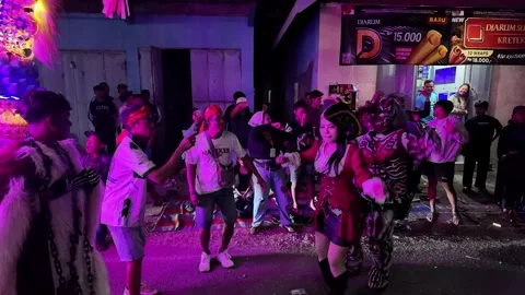 Ground level night carnival parade in Sukowilangun village Stock Footage 345202526