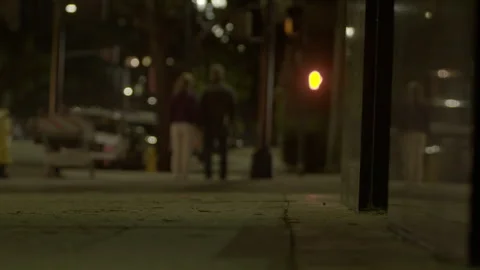 Ground Level Perspective of Empty City Sidewalk at Night Stock Footage 344611458
