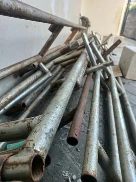 Ground Level Perspective of Messy Scaffolding Pipes Stock Photos