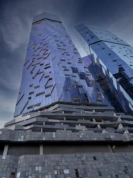 Ground level perspective view of a multistory modern high-rise building Stock Photos