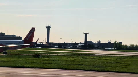 Ground-level POV of aircraft movement at Paris International Airport Stock Footage 321722363