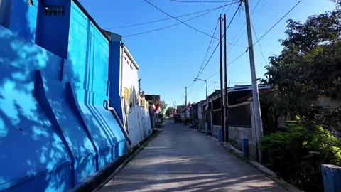 Ground Level POV Along Quiet Village Street in Malang Stock Footage 345149403
