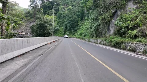 Ground Level POV Along Winding Rural Road Sumberwuluh Видео 345143266