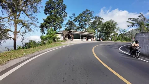 Ground Level POV Along Winding Mountain Road Sumberwuluh Stock Footage 345196904