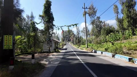 Ground Level POV Drive Through Sukapura Near Bromo Видео 345139860