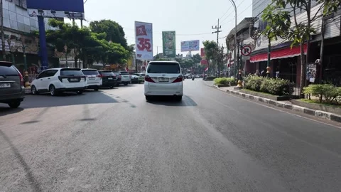 Ground Level POV Drive Through Malang City Street Stock Footage 345200586