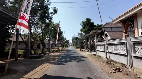 Ground Level POV Driving Through Malang Village Street Stock Footage 345145774