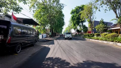 Ground Level POV Driving Through Probolinggo Street Stock Footage 345192154