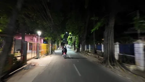 Ground Level POV Night Ride Through Surabaya Street Stock Footage 345203292