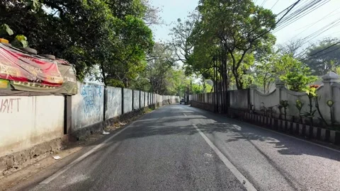 Ground Level POV Quiet Urban Street in Malang Stock Footage 345200711