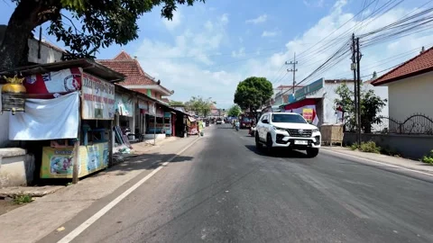 Ground Level POV Road Scene Along Probolinggo Town Street Stock Footage 345193276