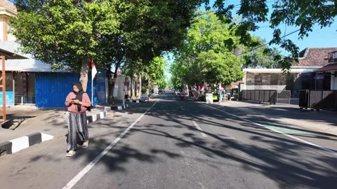 Ground Level POV Street View Through Indonesian Neighborhood Road Vidéo 345138816