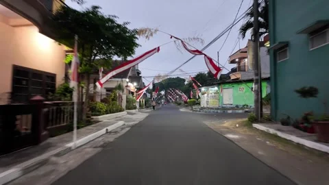 Ground Level POV Through Festive Indonesian Neighborhood Streets Stock Footage 345157029