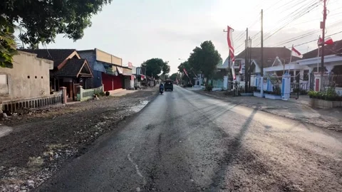 Ground Level Road Through Quiet Indonesian Residential Neighborhood Stock Footage 345158394