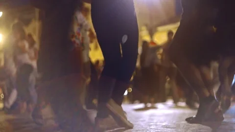 Ground level shot of young people dancing salsa on open-air festivale Stock Footage