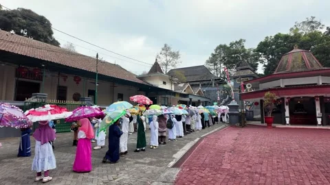 Ground Level View Colorful Maulidur Parade At Pesarean Gunung Kawi Stock Footage 345158043
