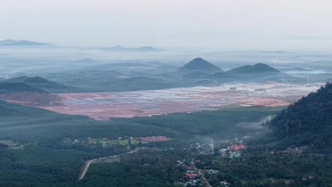 Ground-Level View Of Data Center Amidst Mountain Valley Morning Vidéo 336816895