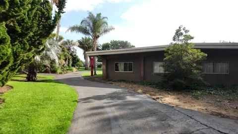 This ground level view documents a casual walk through Chabot College Stock-Footage 325022506
