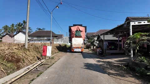 Ground Level View Of Ngajum Housing Area Truck Stock Footage 345147697