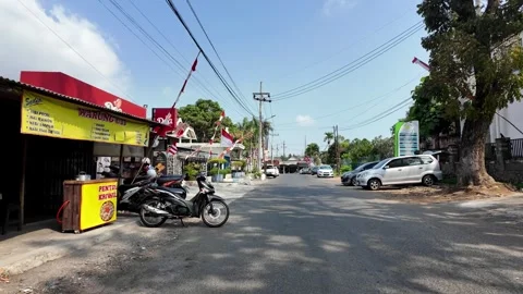 Ground Level View of Sunlit Lawang Road Market Stock Footage 345200279