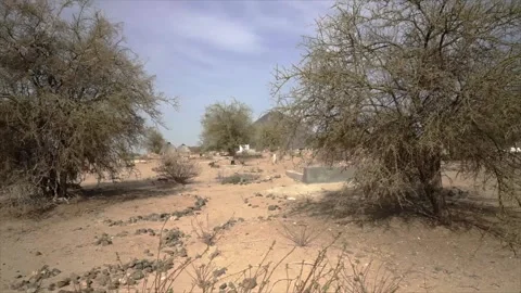 Ground-level view of a traditional stone burial site Vidéo 345001655