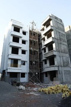 A ground level view of an under construction building Stock Photos