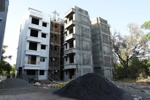 A ground level view of an under construction building Stock Photos
