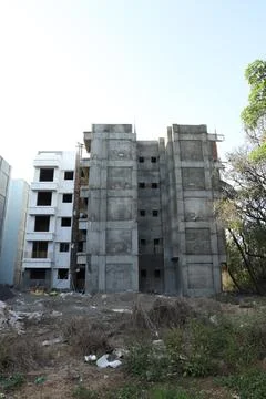 A ground level view of an under construction building Stock Photos