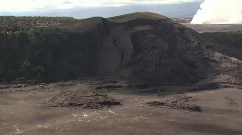 Ground Level View of Volcanic Landscape With A Steam Cloud in the Distance 스톡 동영상 19292046