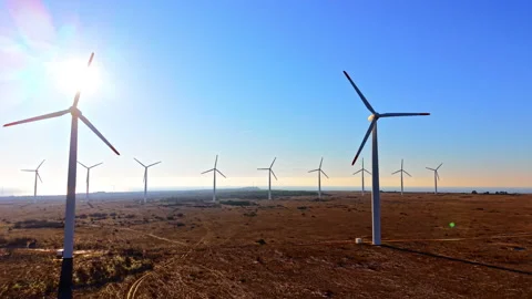 Ground level view of wind turbines at golden hour, Bulgaria Vídeos de archivo 341762279