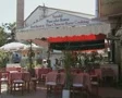 Ground level view of women weaving rug SD Footage