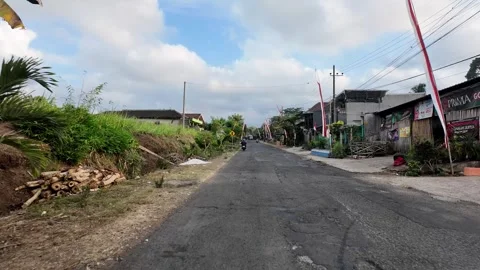 Ground Level Village Street Lined With Indonesian Flags Stock Footage 345201037