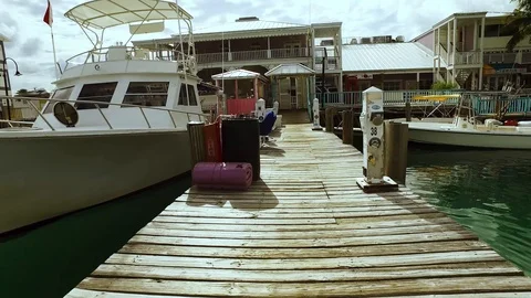 Ground-Level Walk Through Port Lucaya Square and Marina, Grand Bahama Stock Footage 98803397