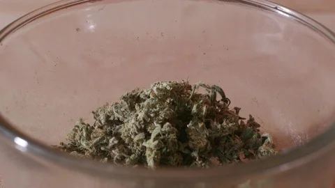 Ground Marijuana Falling Into Dish 스톡 동영상 83017334
