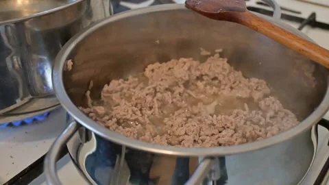 Ground Meat Cooking in Pot, Close-Up Browning Process Stock Footage 336866924