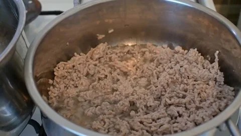 Ground Meat Cooking in Pot, Close-Up Browning Process Stock Footage 336866926