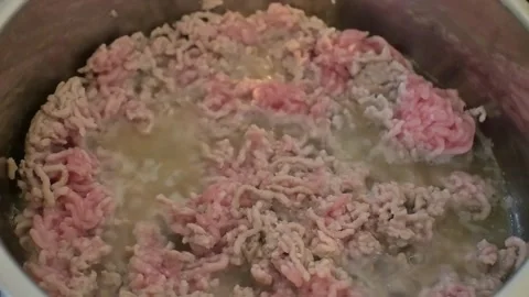 Ground Meat Cooking in Pot, Close-Up Browning Process Stock Footage 336866933